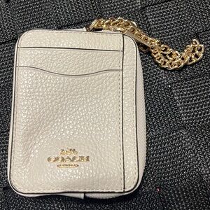 Coach mini wallet. White leather with gold trim and gold chain.